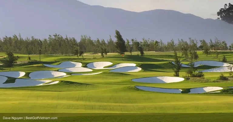 Montgomerie Links Vietnam championship fairway with ocean dunes Da Nang