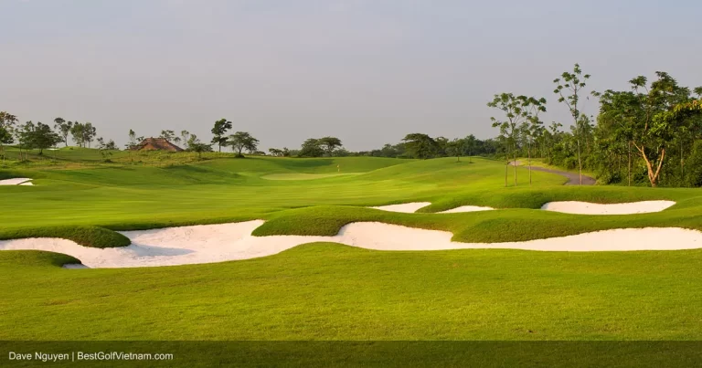 Sky Lake Resort and Golf Club lakeside fairway with mountain reflection Hanoi Vietnam